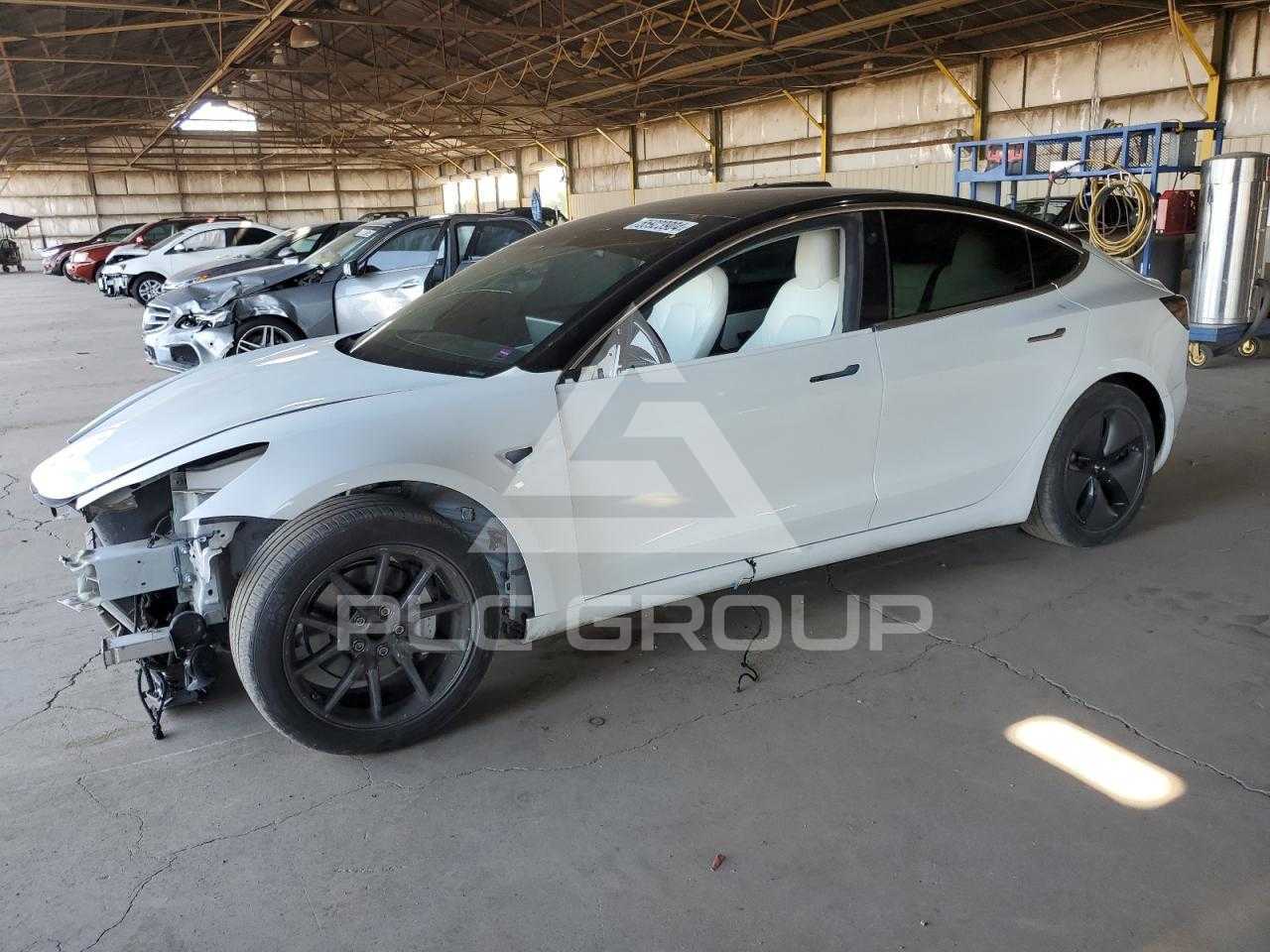 2019 Tesla Model 3 VIN: 5YJ3E1EA5KF407631 з США - PLC Group
