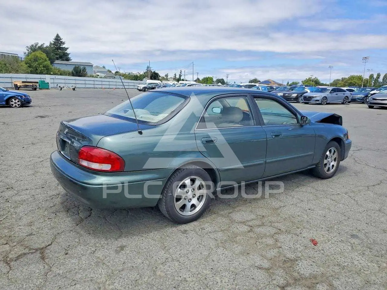 1999 Mazda 626 VIN: 1YVGF22C3X5853466 из США - PLC Group