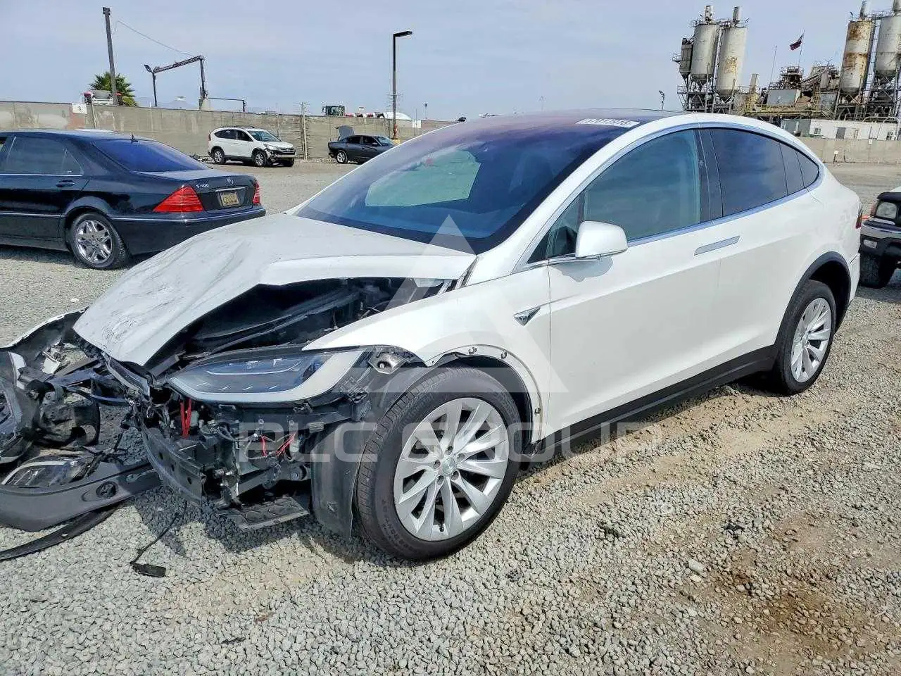 2017 Tesla Model X VIN: 5YJXCBE27HF070152 из США - PLC Group