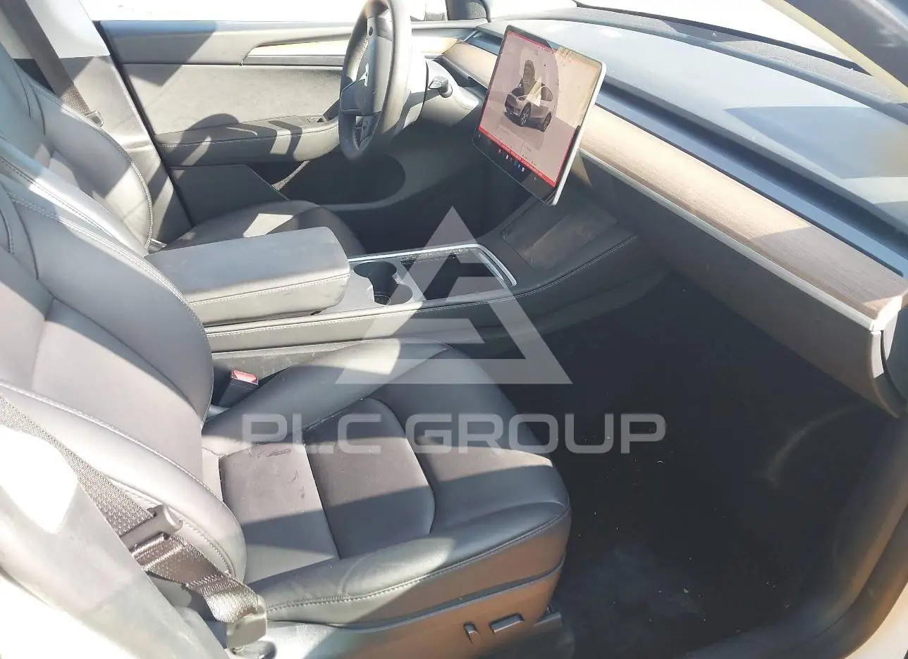 2023 Tesla Model Y VIN: 7SAYGAEE6PF758870 з США - PLC Group