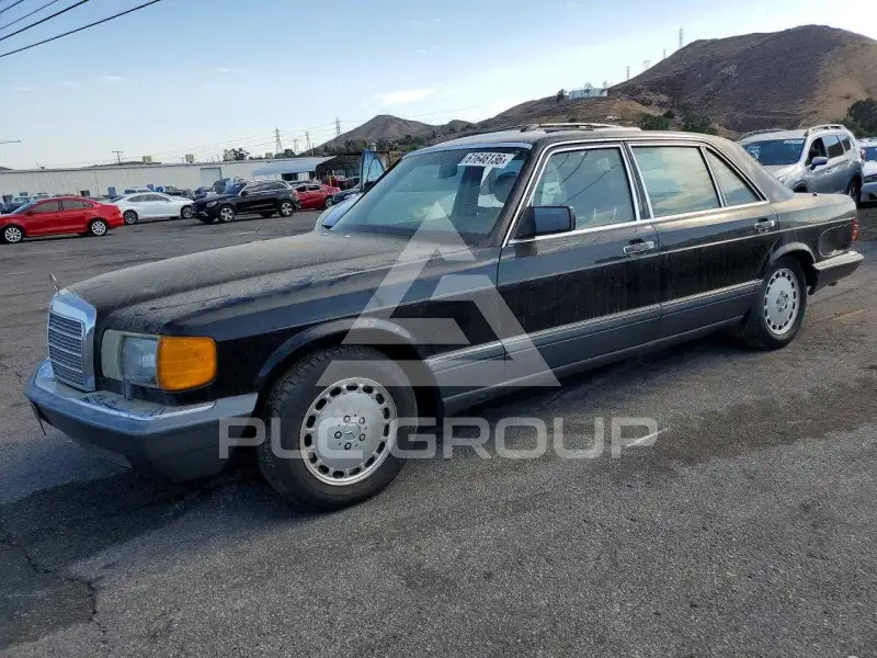 1990 Mercedes Benz 560 photo