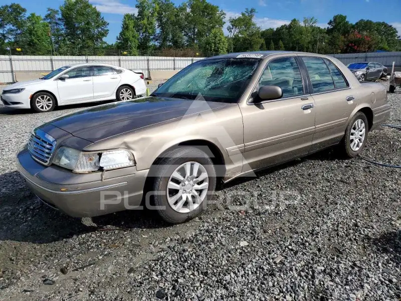 2002 Ford CROWN фото