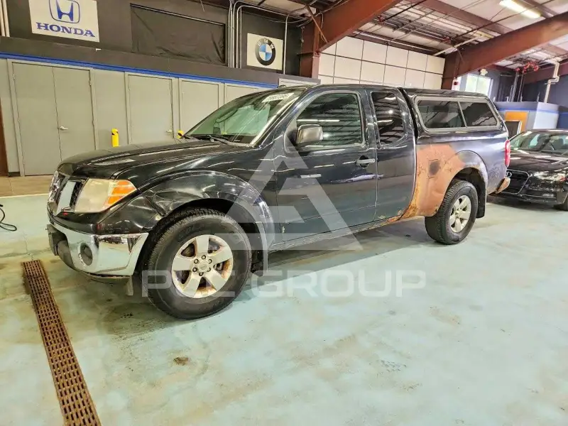 2011 Nissan FRONTIER фото