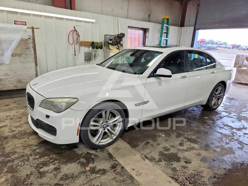 2012 BMW 740 фото