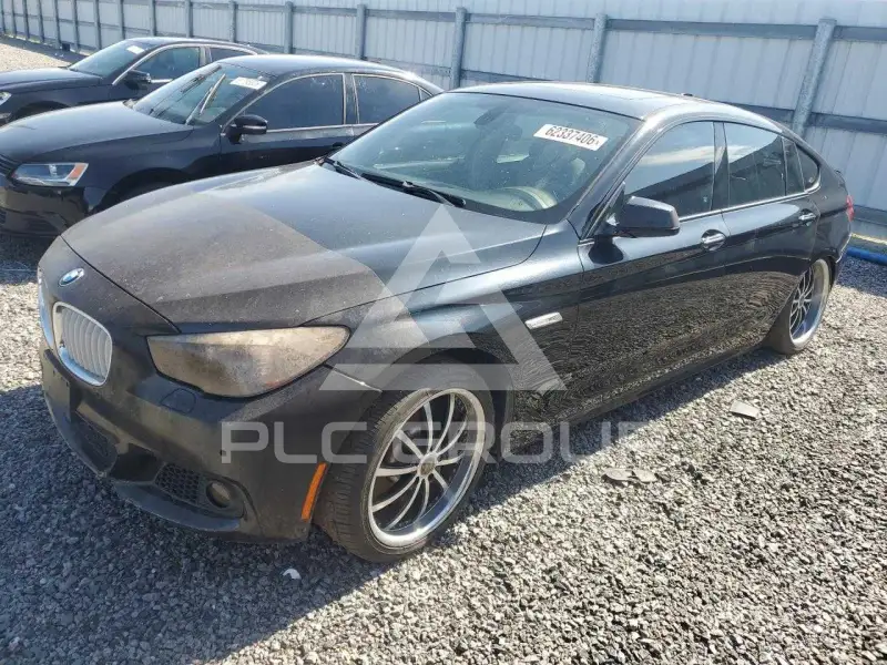 2012 BMW 550 фото