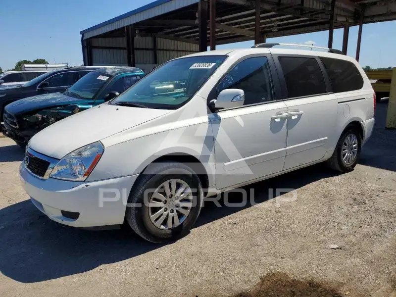 2012 KIA Sedona фото