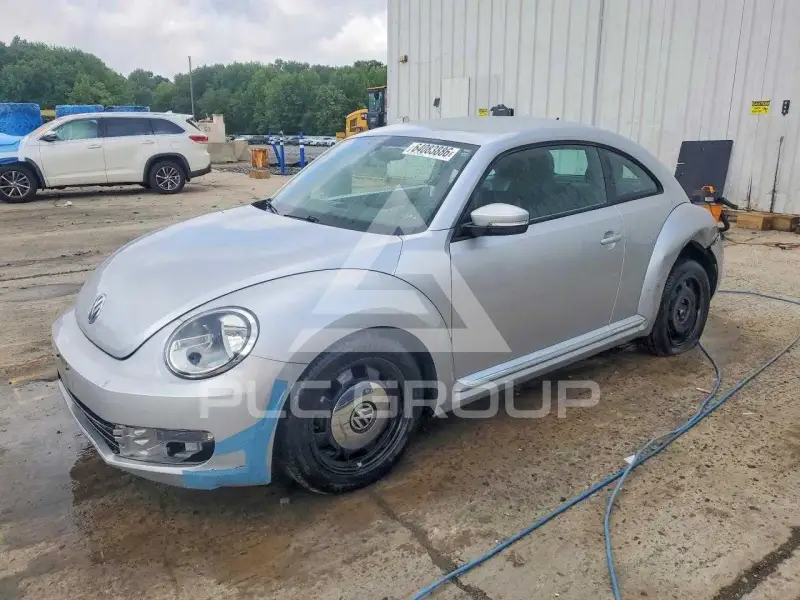 2012 Volkswagen BEETLE фото