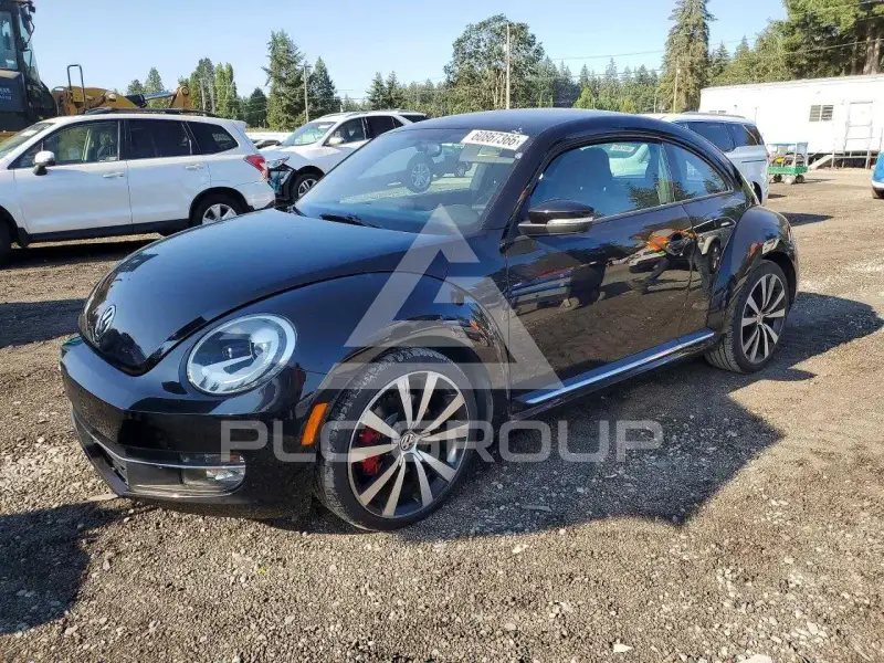 2012 Volkswagen BEETLE фото