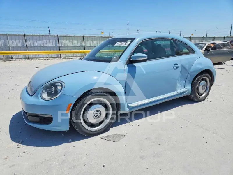 2012 Volkswagen BEETLE фото