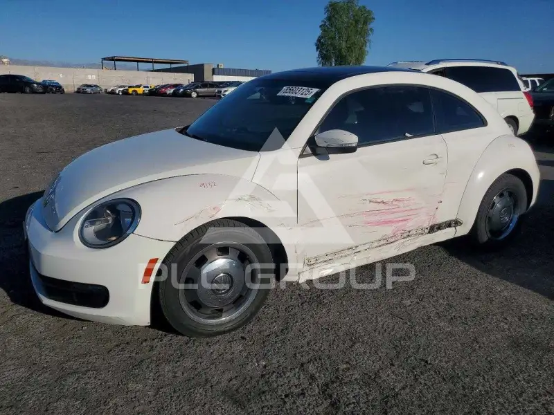2012 Volkswagen BEETLE фото