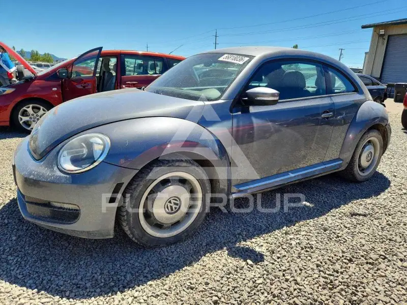 2012 Volkswagen BEETLE фото