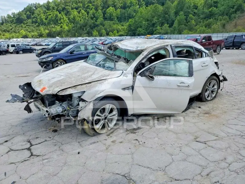 2013 Ford TAURUS фото
