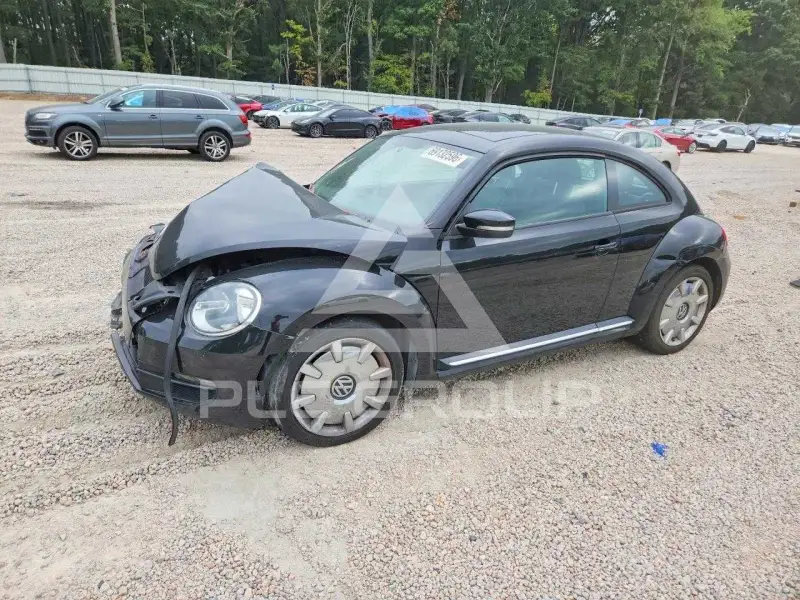 2013 Volkswagen BEETLE фото
