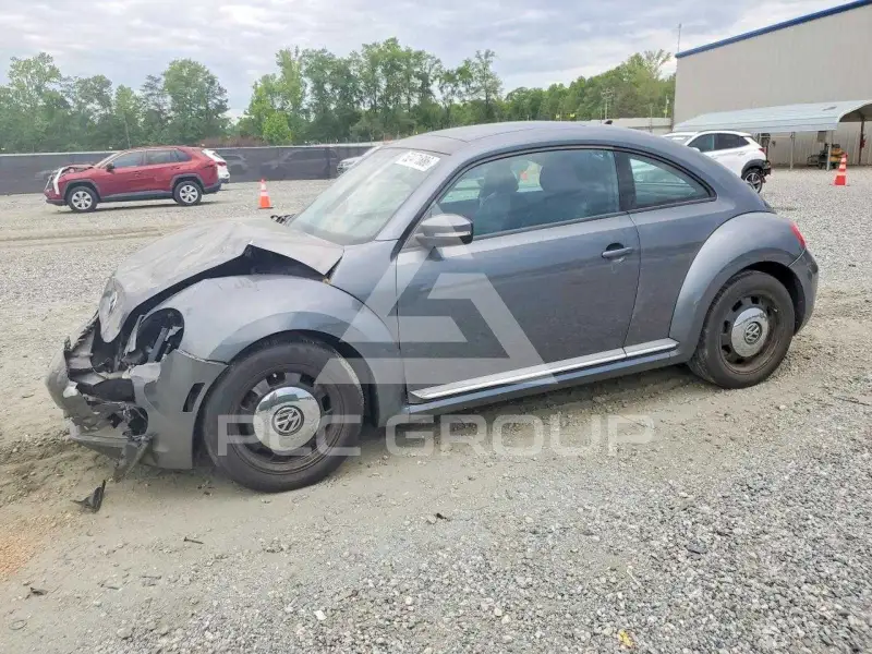 2013 Volkswagen BEETLE фото