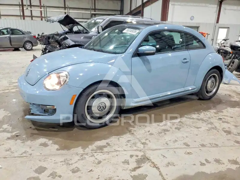 2013 Volkswagen BEETLE фото