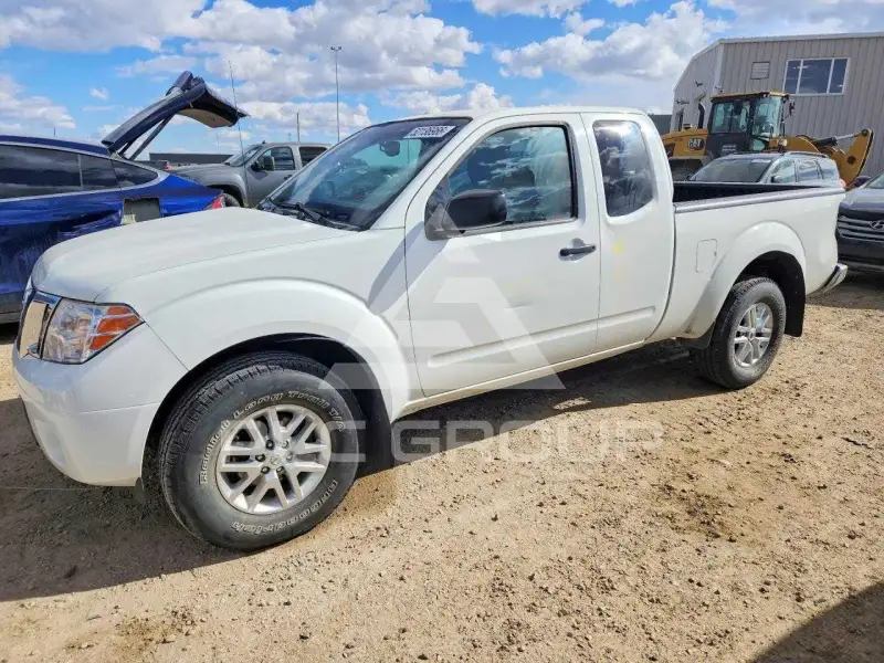 2014 Nissan FRONTIER фото