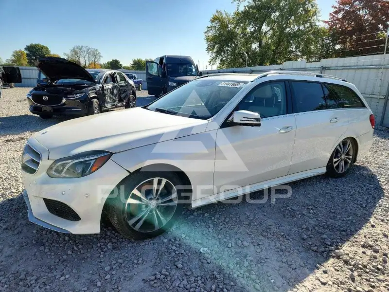 2014 Mercedes Benz E-Class фото