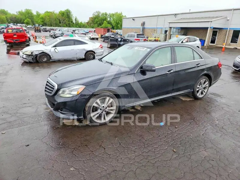 2014 Mercedes Benz E-Class фото