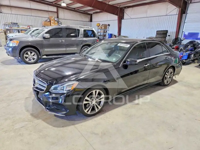 2014 Mercedes Benz E-Class фото