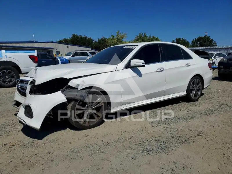 2014 Mercedes Benz E-Class фото