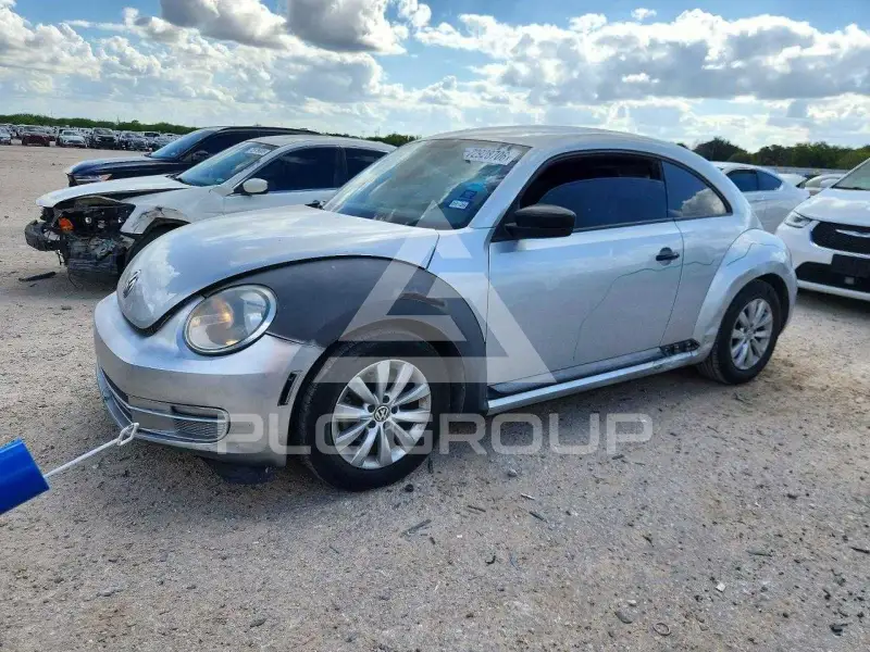 2014 Volkswagen BEETLE фото