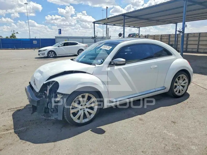 2014 Volkswagen BEETLE фото