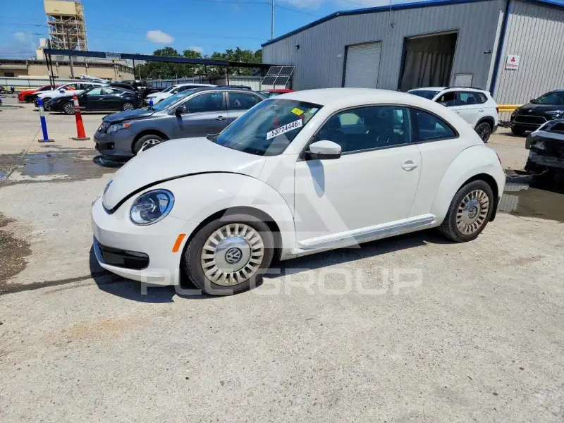2014 Volkswagen BEETLE фото
