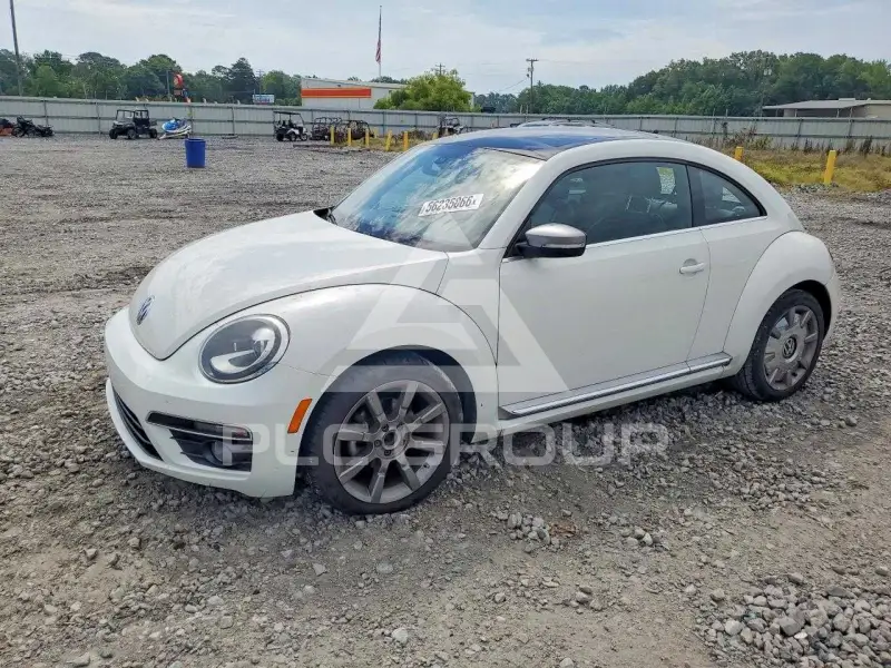 2014 Volkswagen BEETLE фото