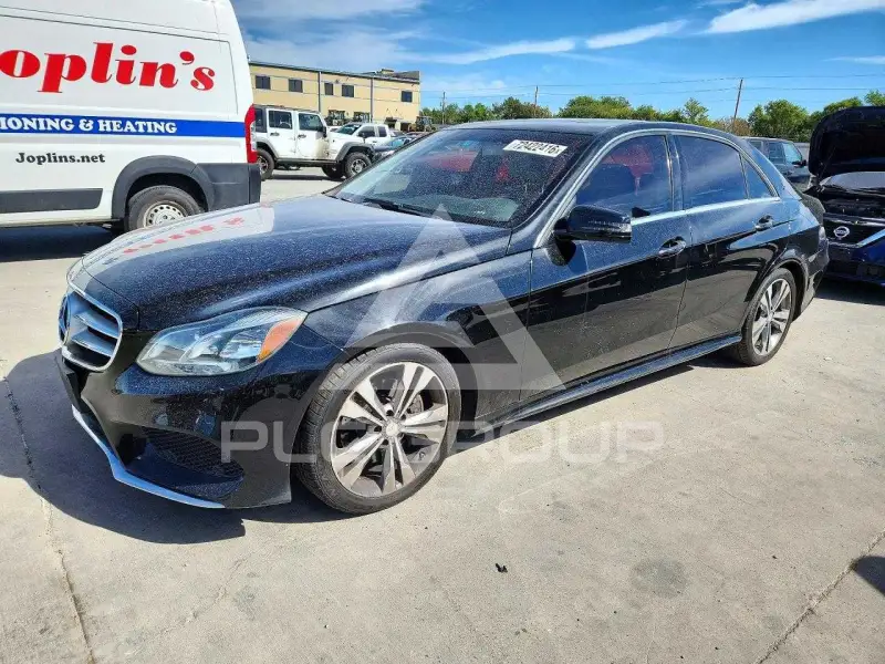 2015 Mercedes Benz E-Class фото