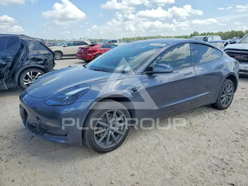 2023 Tesla Model 3 фото