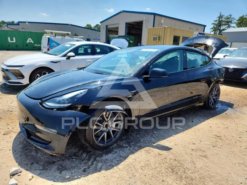 2023 Tesla Model 3 фото