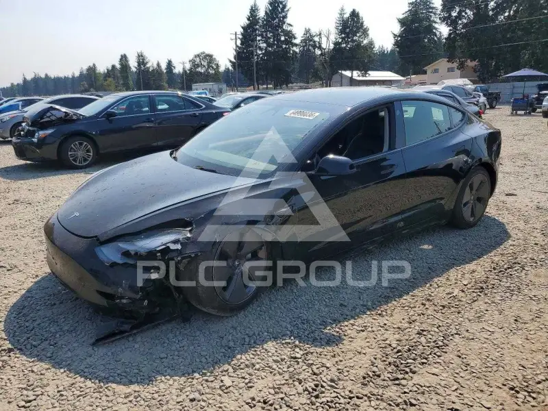 2023 Tesla Model 3 фото