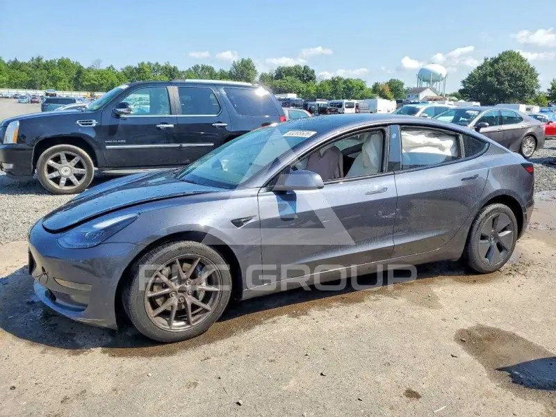 2023 Tesla Model 3 фото