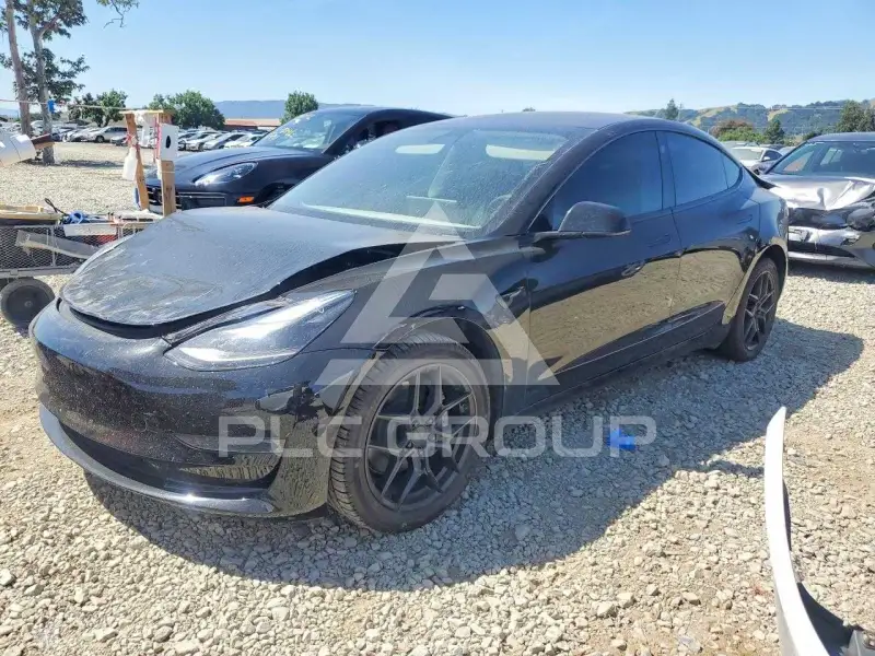 2023 Tesla Model 3 фото