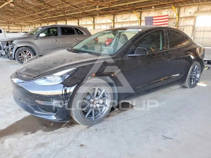2023 Tesla Model 3 фото