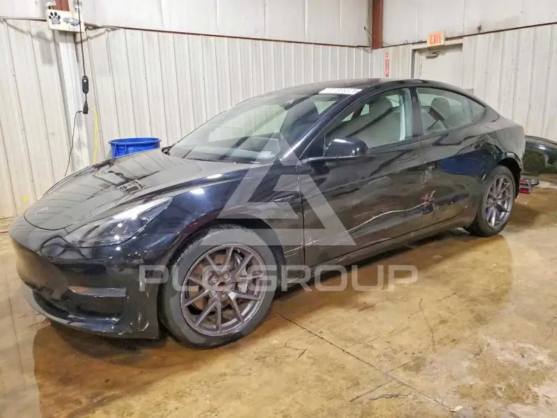 2023 Tesla Model 3 фото