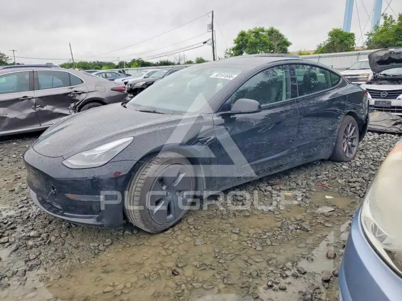 2023 Tesla Model 3 фото