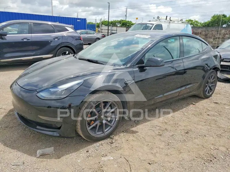 2023 Tesla Model 3 фото