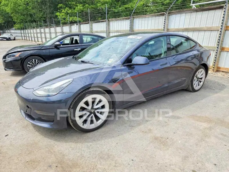 2023 Tesla Model 3 фото