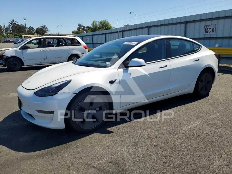 2023 Tesla Model 3 фото