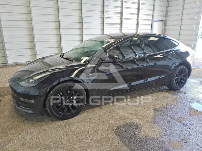 2023 Tesla Model 3 фото