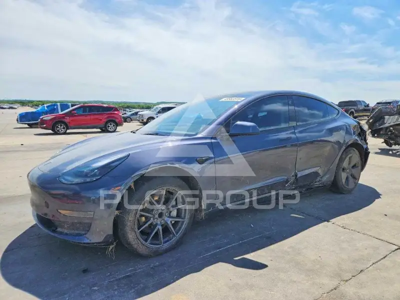2023 Tesla Model 3 фото