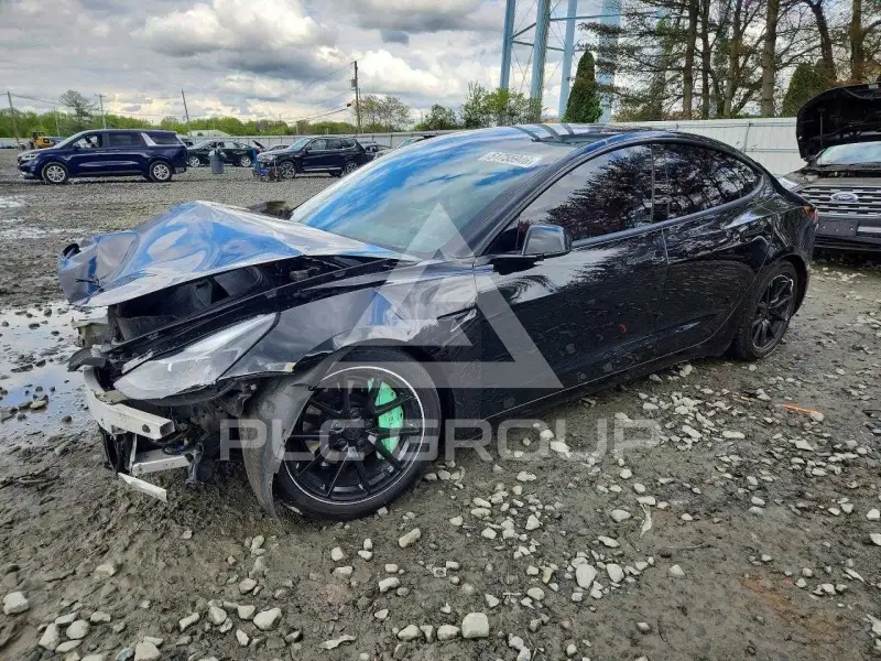2023 Tesla Model 3 фото