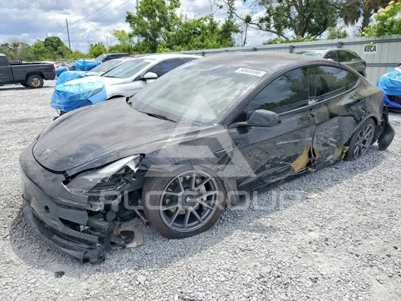 2023 Tesla Model 3 фото
