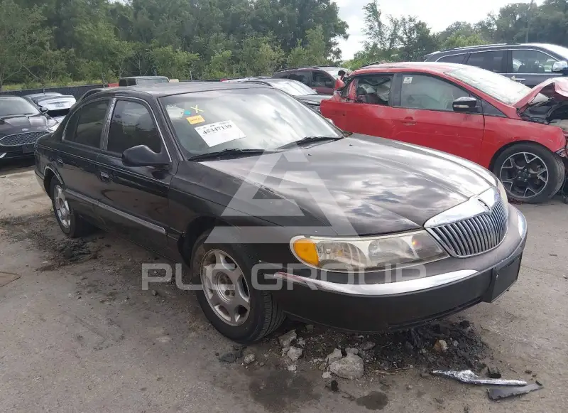 2000 Lincoln Continental фото