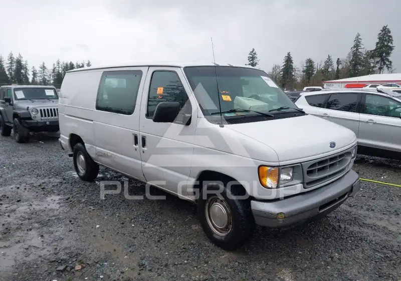 2002 Ford E-150 фото