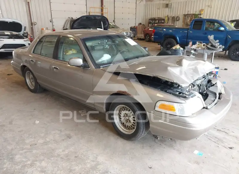 2002 Ford CROWN фото