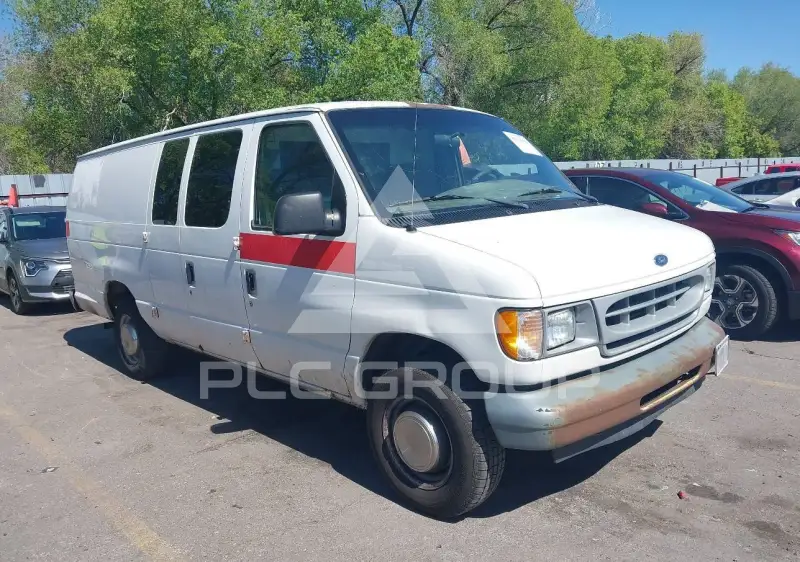 2002 Ford E-250 фото