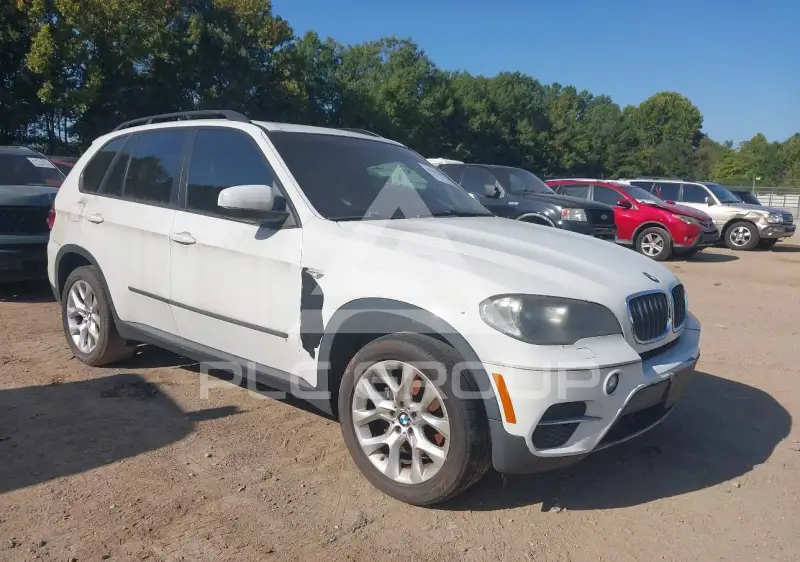 2011 BMW X5 фото