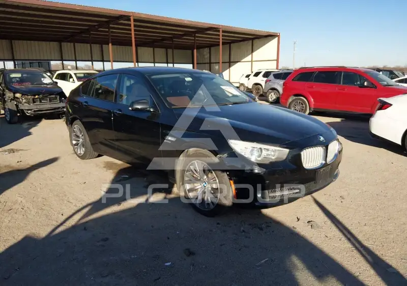 2012 BMW 550 фото